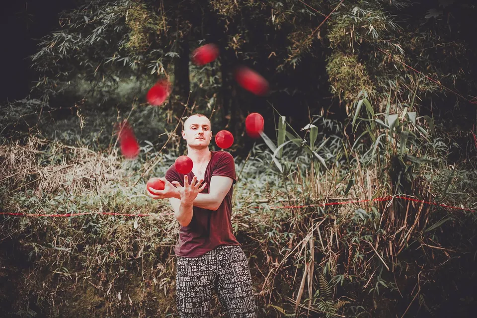 Ben juggling in a bamboo grove